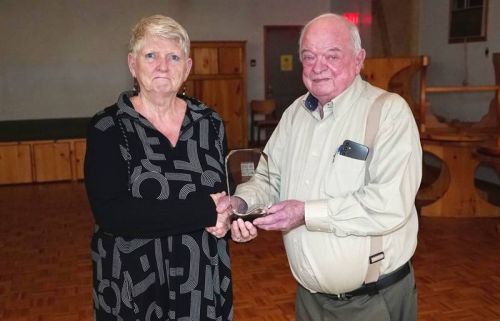 Mary Kelly received the Addington Highlnds Community Builder Citizen of the Year Award, presented by Reeve Henry Hogg.